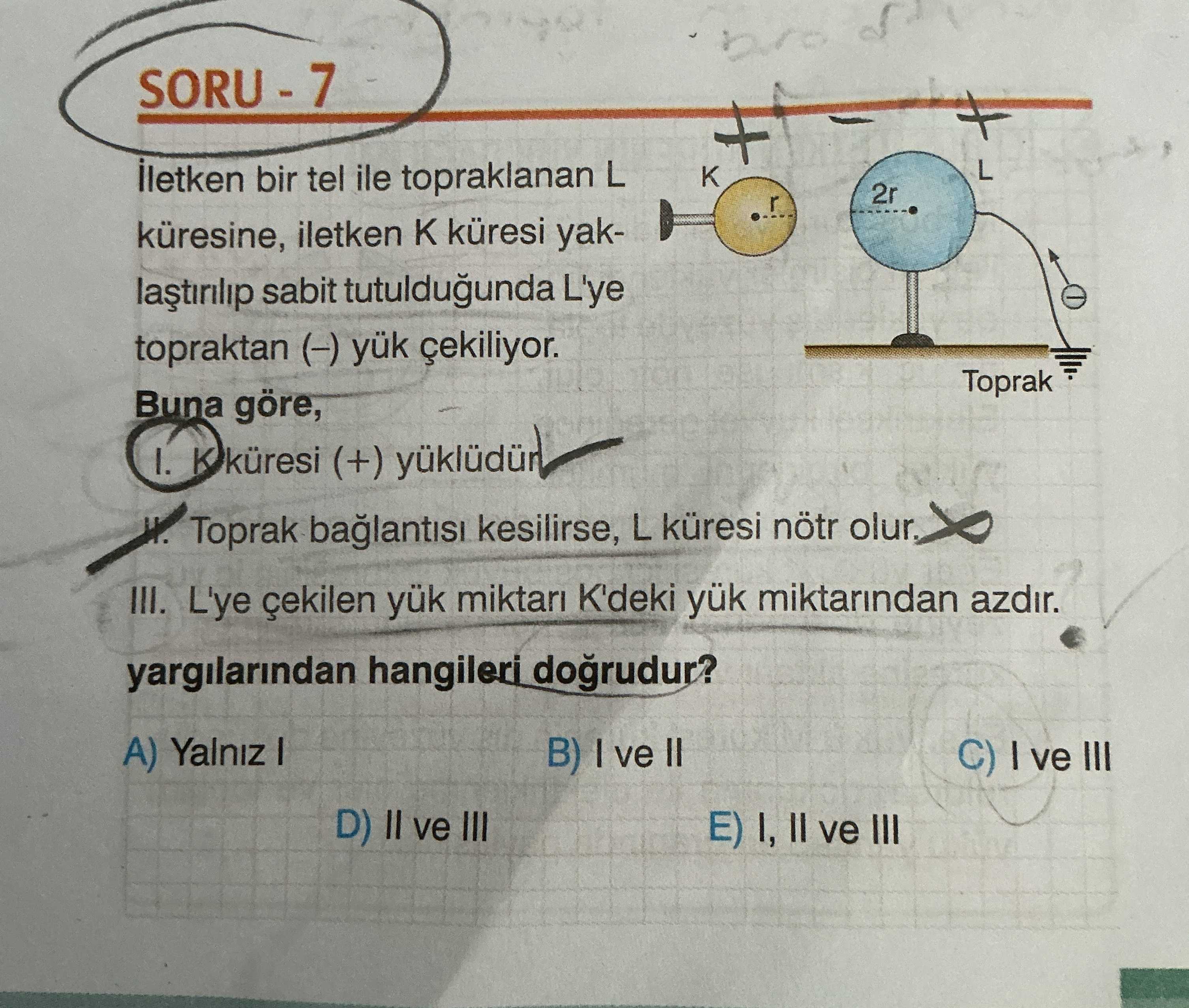 İletken bir tel ile topraklanan L küresine, iletken K küresi yaklaştırılıp sabit tutulduğunda L'ye